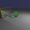 Une boule en verre vert posé devant un mirroir